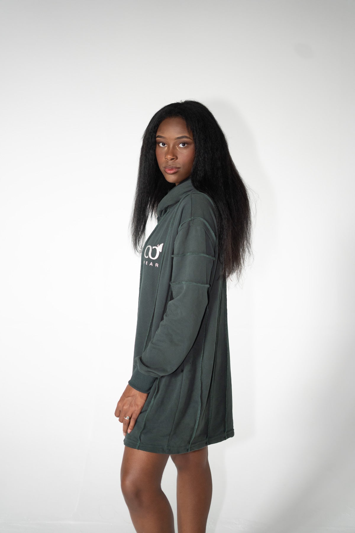This green comfort hoodie dress for women is designed to be super comfortable, soft, and high quality, suitable for everyday wear. Made from sustainable materials, it's a popular and cute choice.