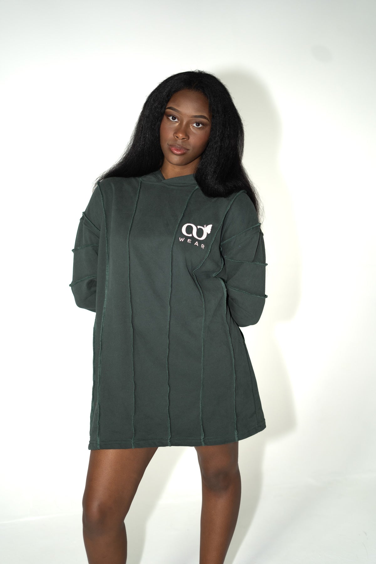 This green comfort hoodie dress for women is designed to be super comfortable, soft, and high quality, suitable for everyday wear. Made from sustainable materials, it's a popular and cute choice.