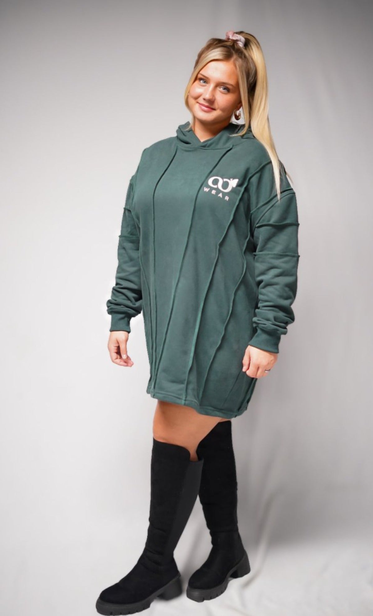 This green comfort hoodie dress for women is designed to be super comfortable, soft, and high quality, suitable for everyday wear. Made from sustainable materials, it's a popular and cute choice.