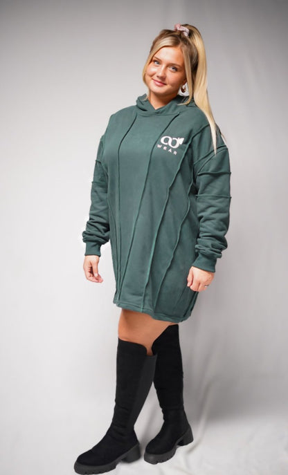 This green comfort hoodie dress for women is designed to be super comfortable, soft, and high quality, suitable for everyday wear. Made from sustainable materials, it's a popular and cute choice.